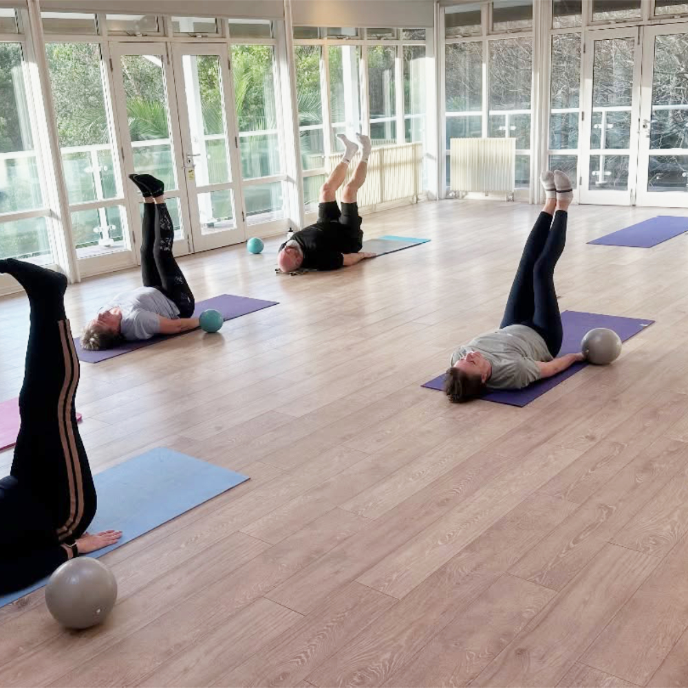 People in a fitness pilates class.