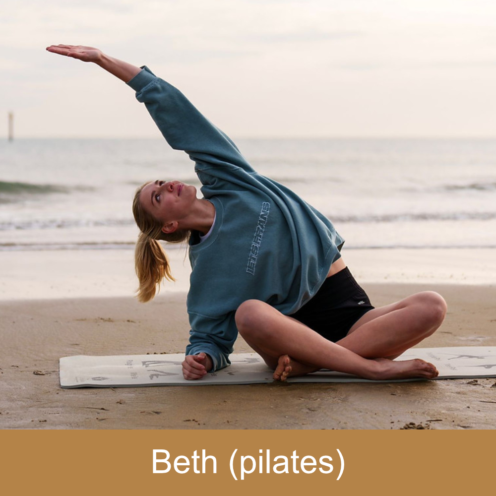 A lady practicing pilates.
