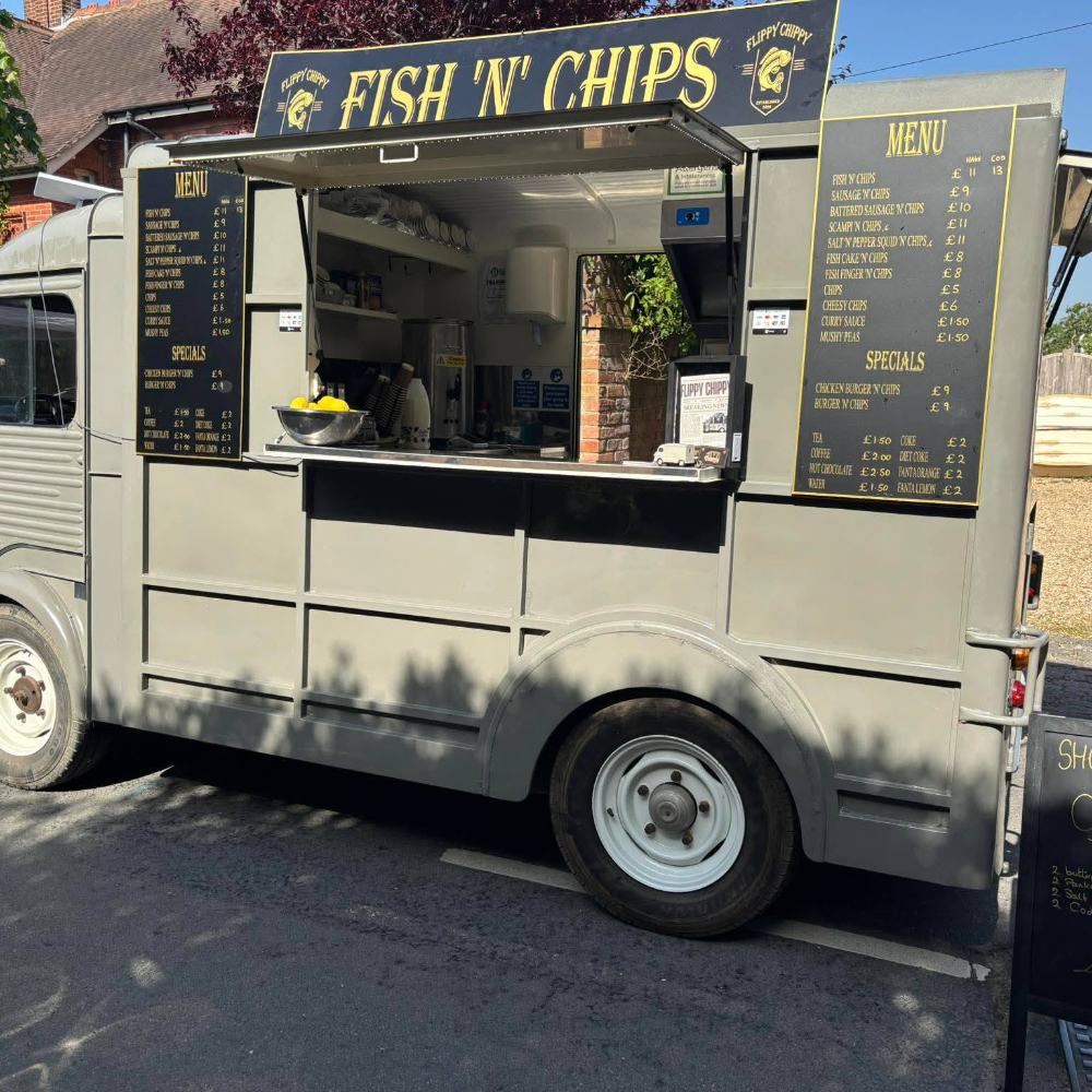 A mobile fish and chip van.