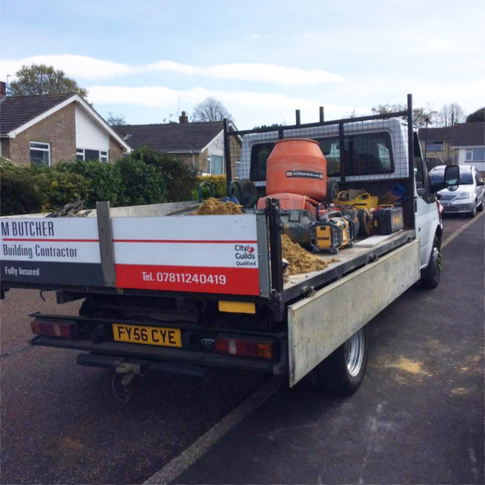 A builder's flat bed truck.