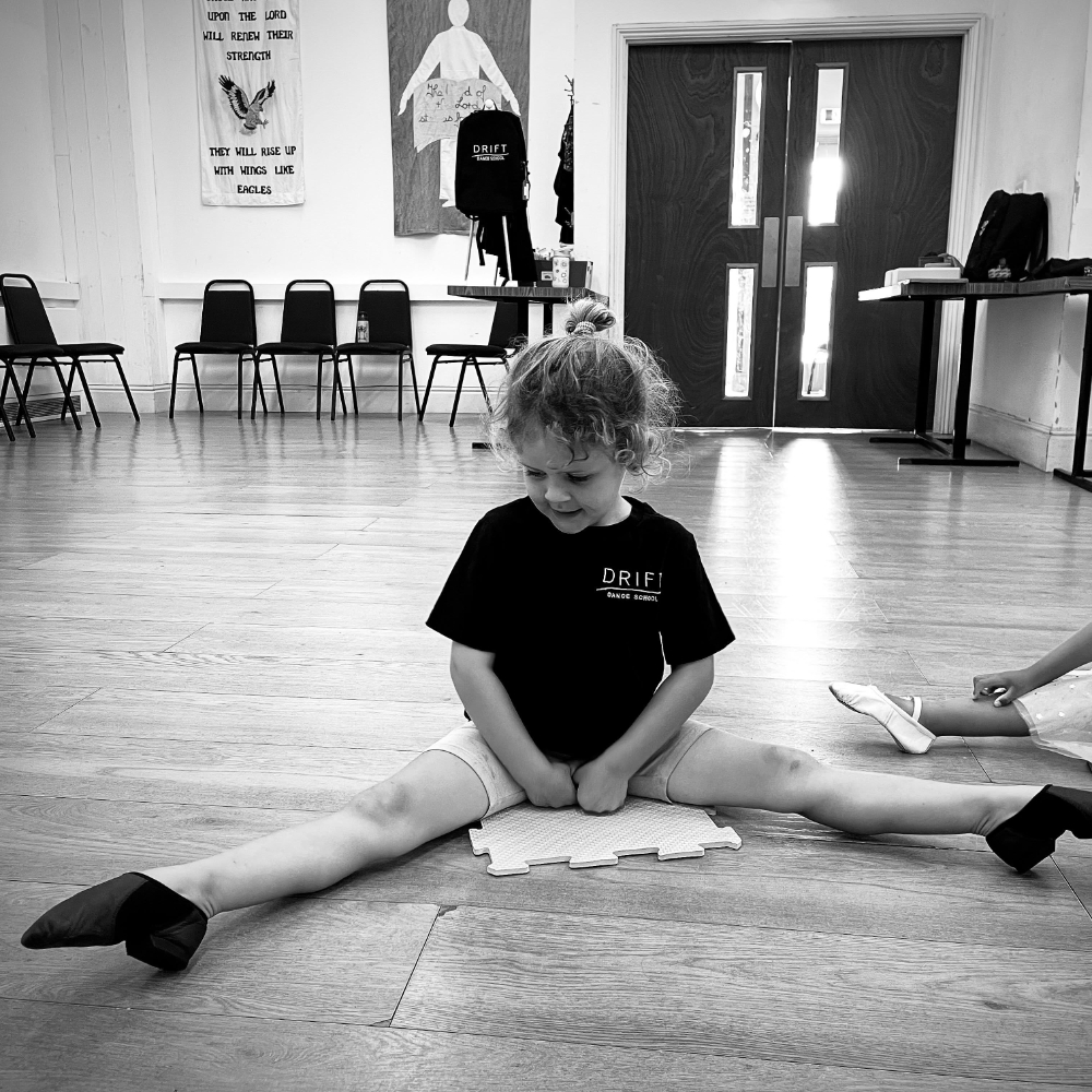 A child demonstrating ballet points.