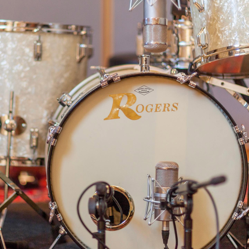 A vintage drum kit with vintage mics.