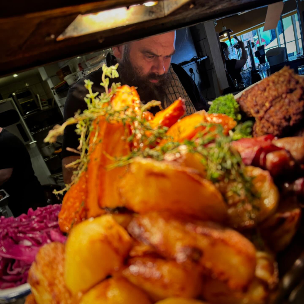 A chef cooking a Sunday roast.