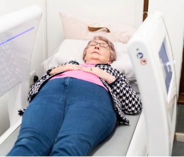 A person lying on a bedAI-generated content may be incorrect.