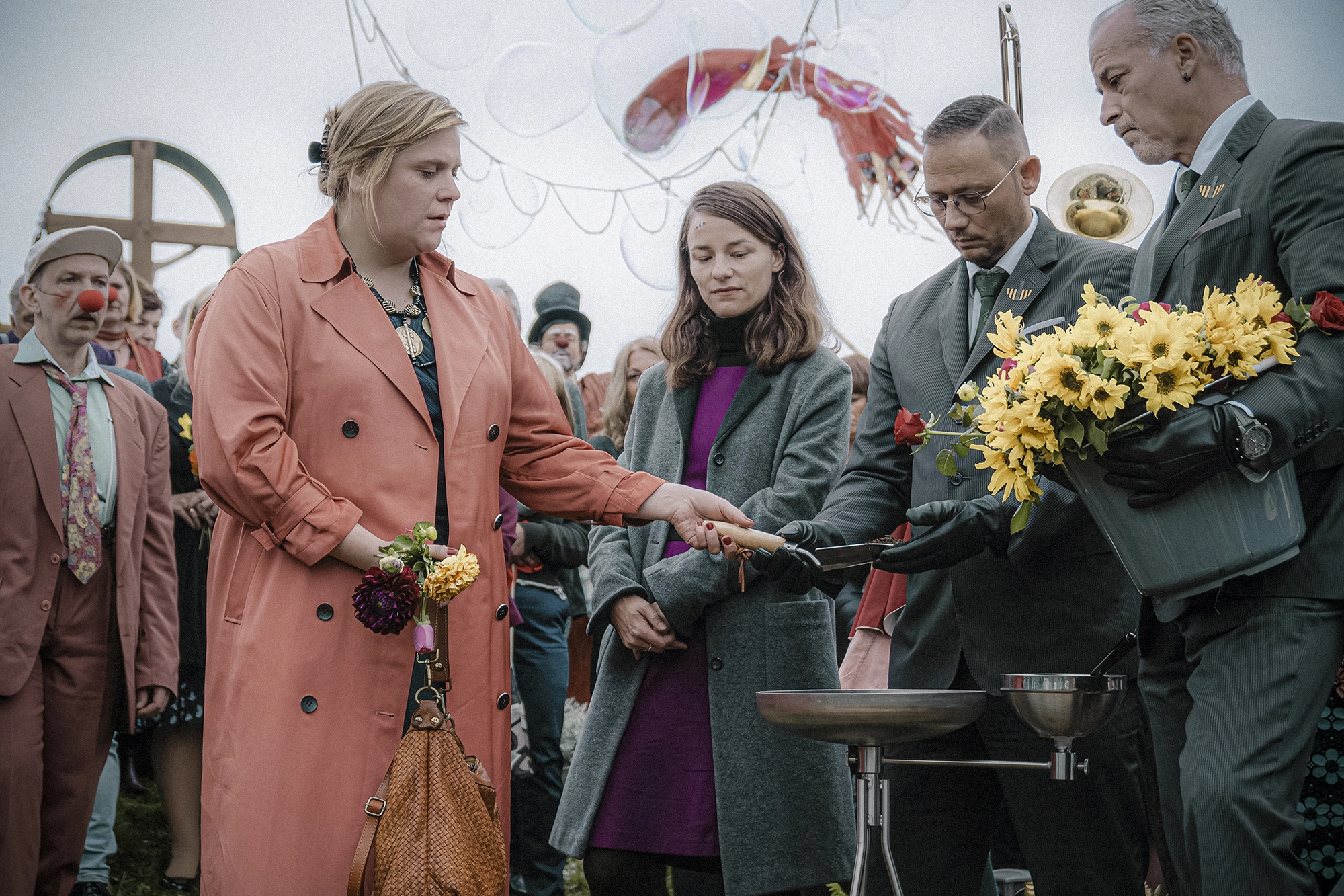 Nikolett Kustos photographed Film Still from movie Four Minus Three (Vier Minus Drei). Two women at a funeral(actress Valerie Pachner and actress Stefanie Reinsperger)