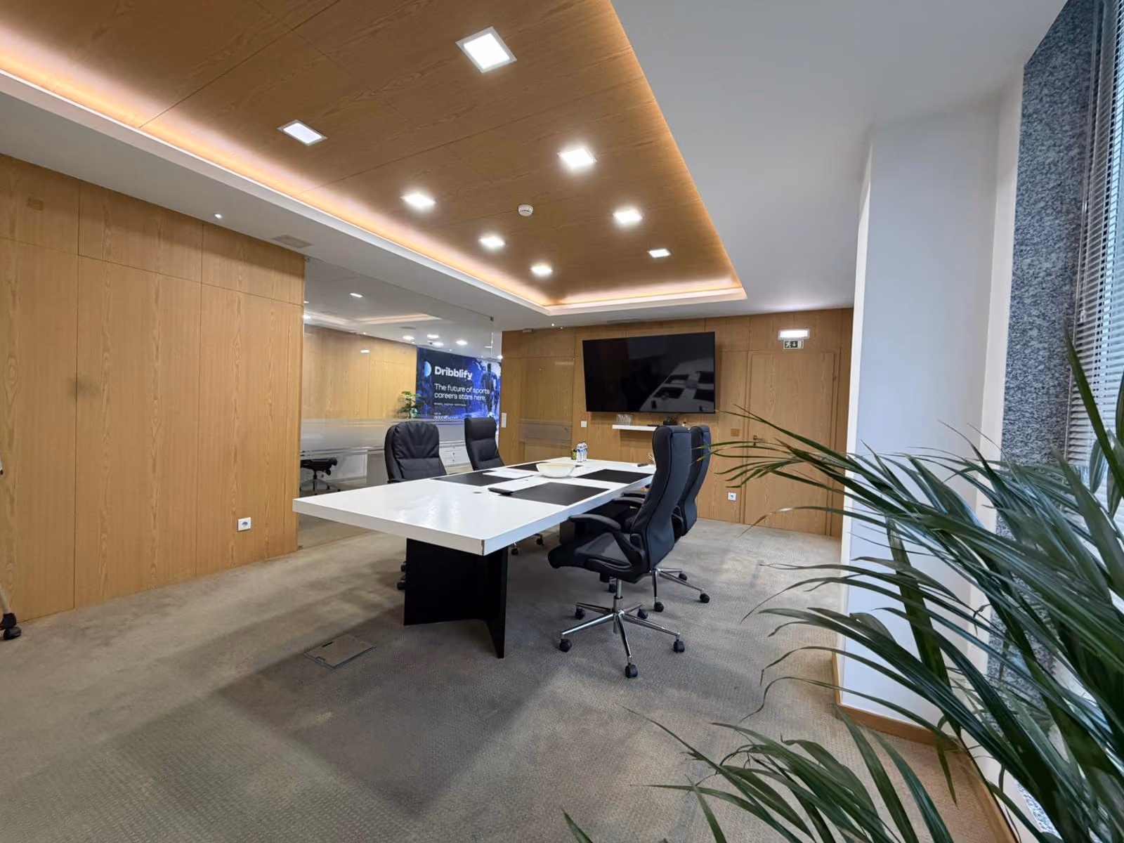 Wood-panelled meeting room at the Vila do Conde office