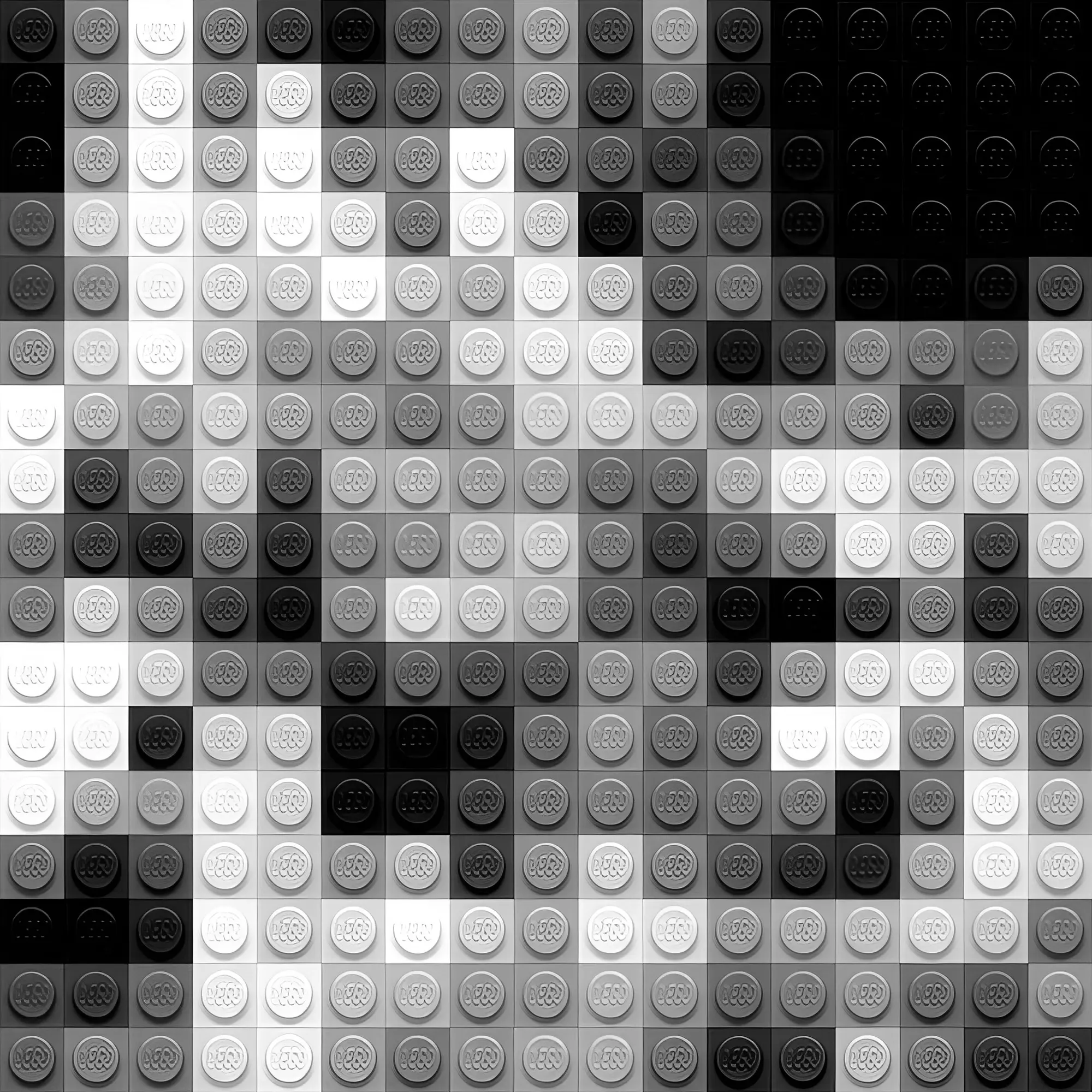 Abstract black-and-white mosaic of building blocks forming a pixelated pattern