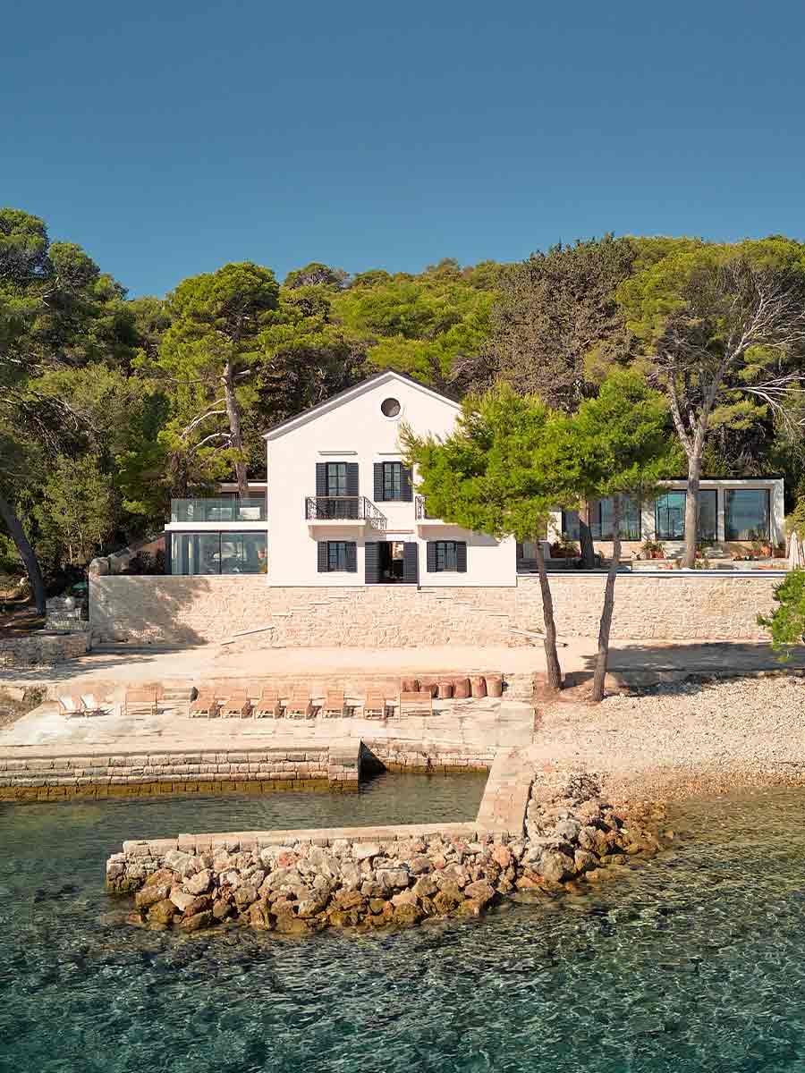 Stunning contemporary villa overlooking the Adriatic Sea, featuring a private dock and refined architectural finishes.
