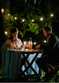 Couple dining in the garden