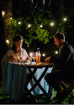 Couple dining in the garden