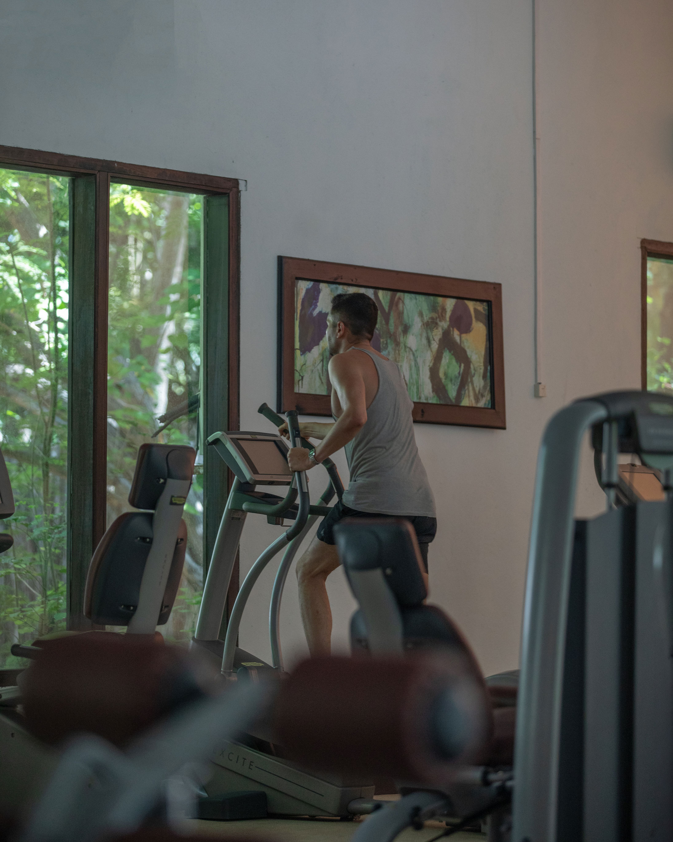 A person working out in the Fitness Centre in the Kihaa Resort
