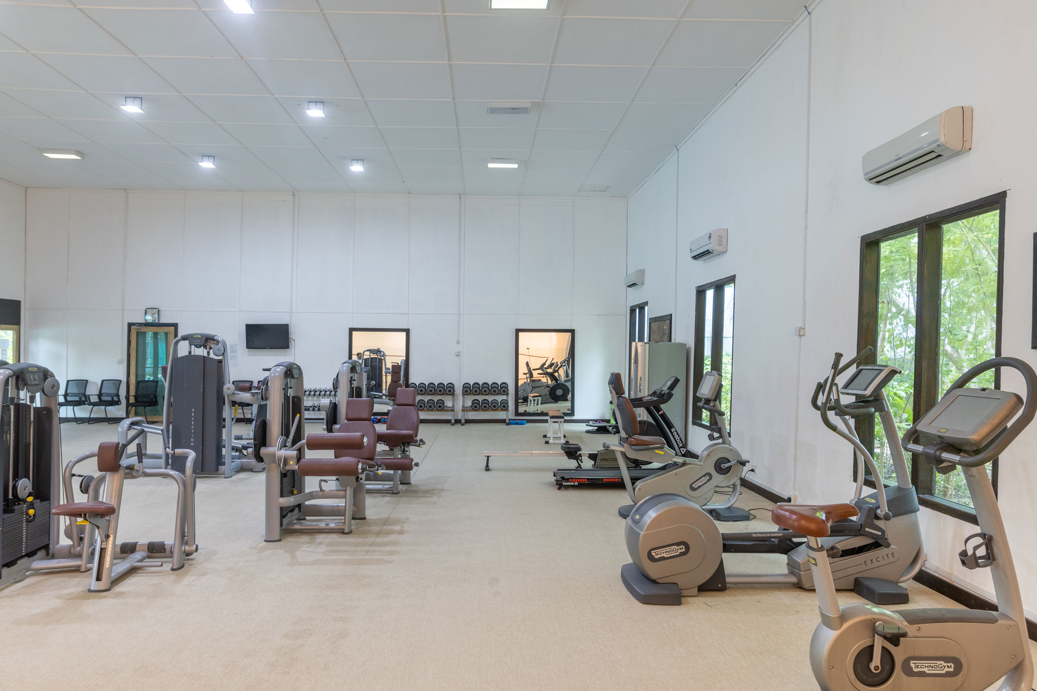 A person working out in the Fitness Centre in the Kihaa Resort