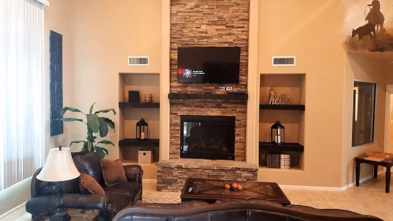 Lobby with large stone fire place