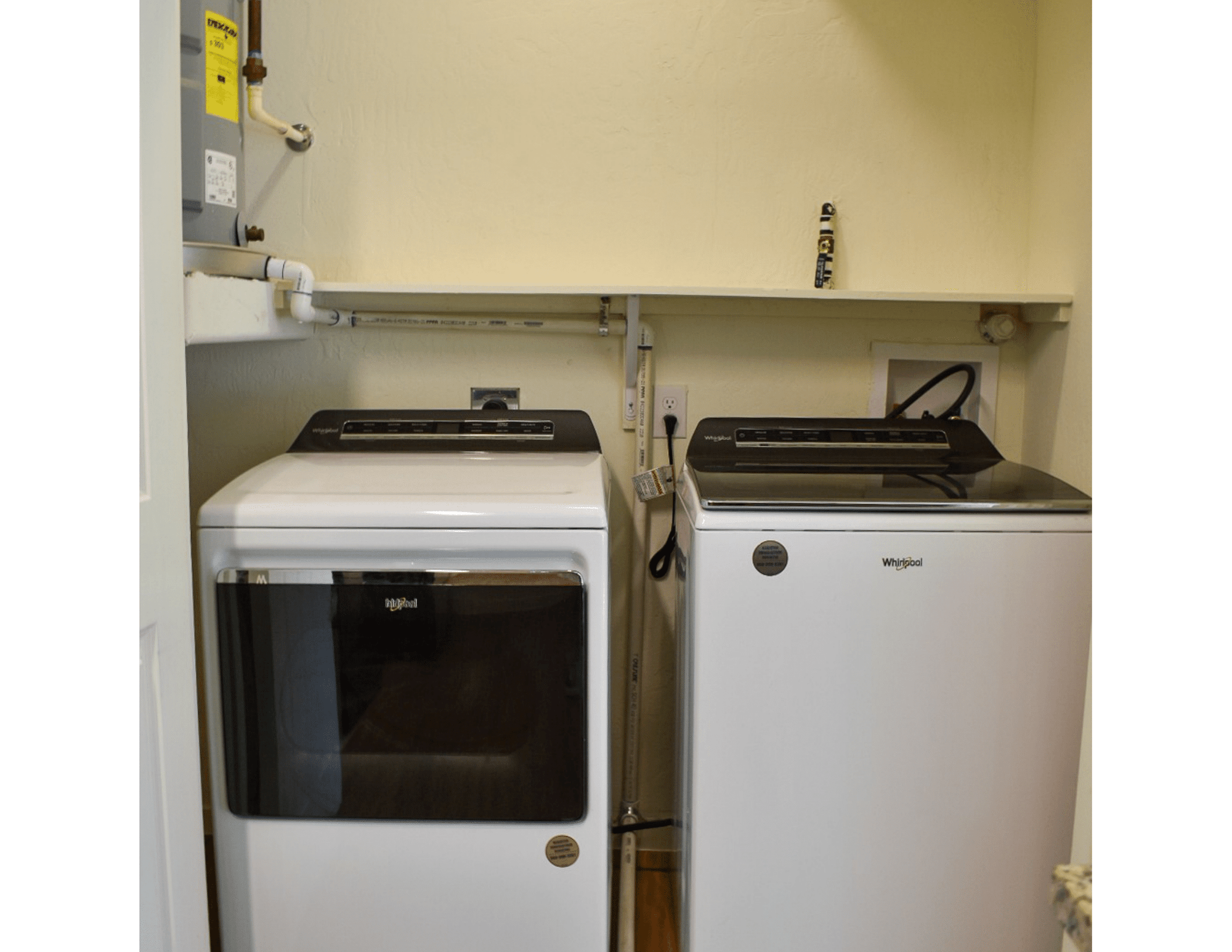 laundry room with white appliances