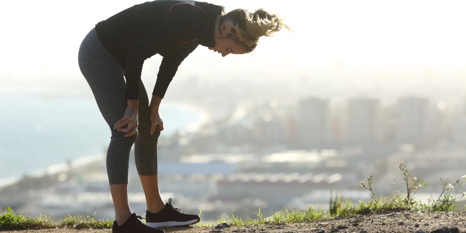 an exhausted woman, runner, sundowner