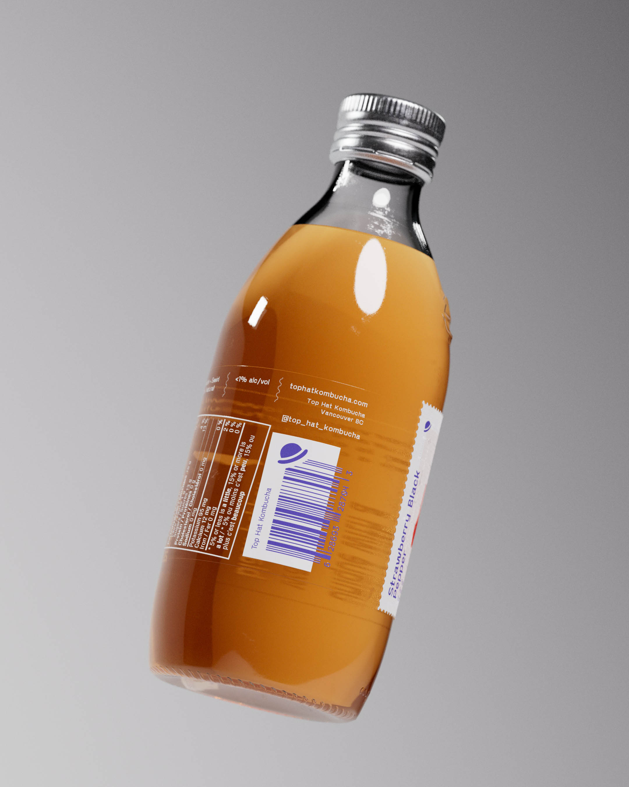 The back view of a Top Hat Kombucha bottle with the Strawberry Black Pepper flavor, focusing on the secondary transparent label. This label provides nutritional facts, a barcode, and ingredient details, strategically placed over the warm amber hue of the drink. The primary label, partially overlapped by the secondary, features abstract geometric art in spot Pantone colors, representing the distinctive flavor. The custom-molded bottle showcases the iconic embossed hat logo above the label, emphasizing the premium branding of this #kombucha. The meticulous label placement ensures regulatory compliance while conveying comprehensive product information. 