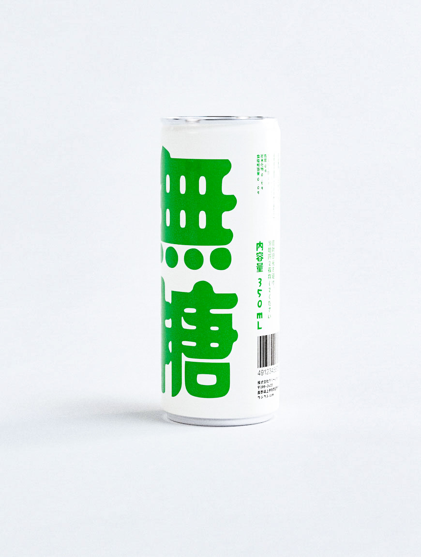 Playful packaging design for Japanese apple juice featuring minimalist fruit illustration paired with bold typographic treatment on white aluminum can. Design studio portfolio piece demonstrating creative branding through strategic use of green accent colors and bilingual text integration. Professional packaging design agency work balancing whimsical apple graphic with sophisticated Japanese typography for premium juice brand positioning in competitive beverage market.