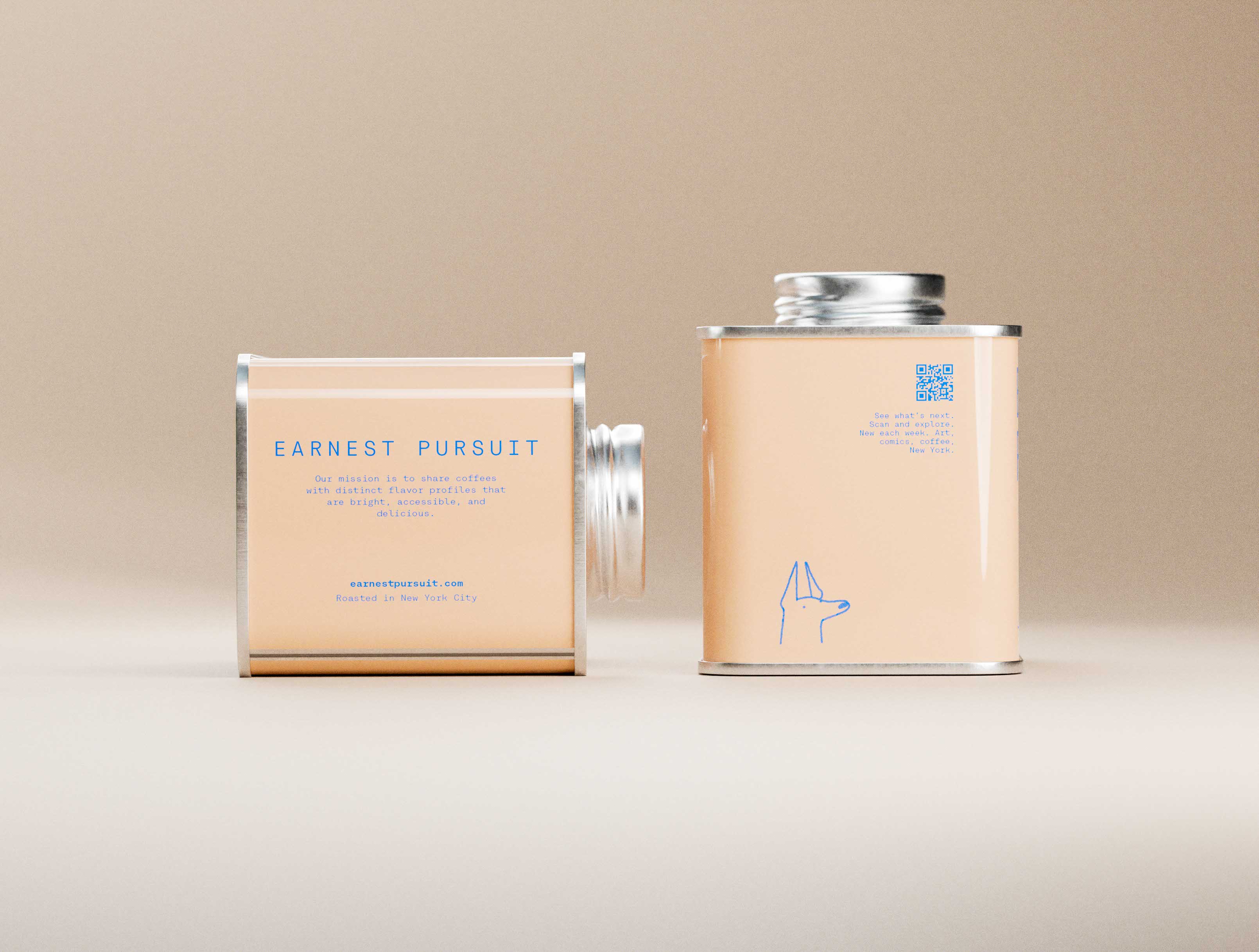 Two sand-colored Earnest Pursuit coffee tins are presented against a warm neutral backdrop, one upright and one rotated to reveal the base panel. Blue sans-serif typography reads “Earnest Pursuit,” accompanied by concise mission text and roasting location details. A small blue QR code appears near the top right of the upright tin, while a minimal line illustration of a Doberman anchors the lower section. The metallic lid and frame catch soft, directional light, emphasizing material contrast. The composition reflects packaging design studio discipline, where branding, hierarchy, and proportion are resolved through precise graphic design and restrained art direction.