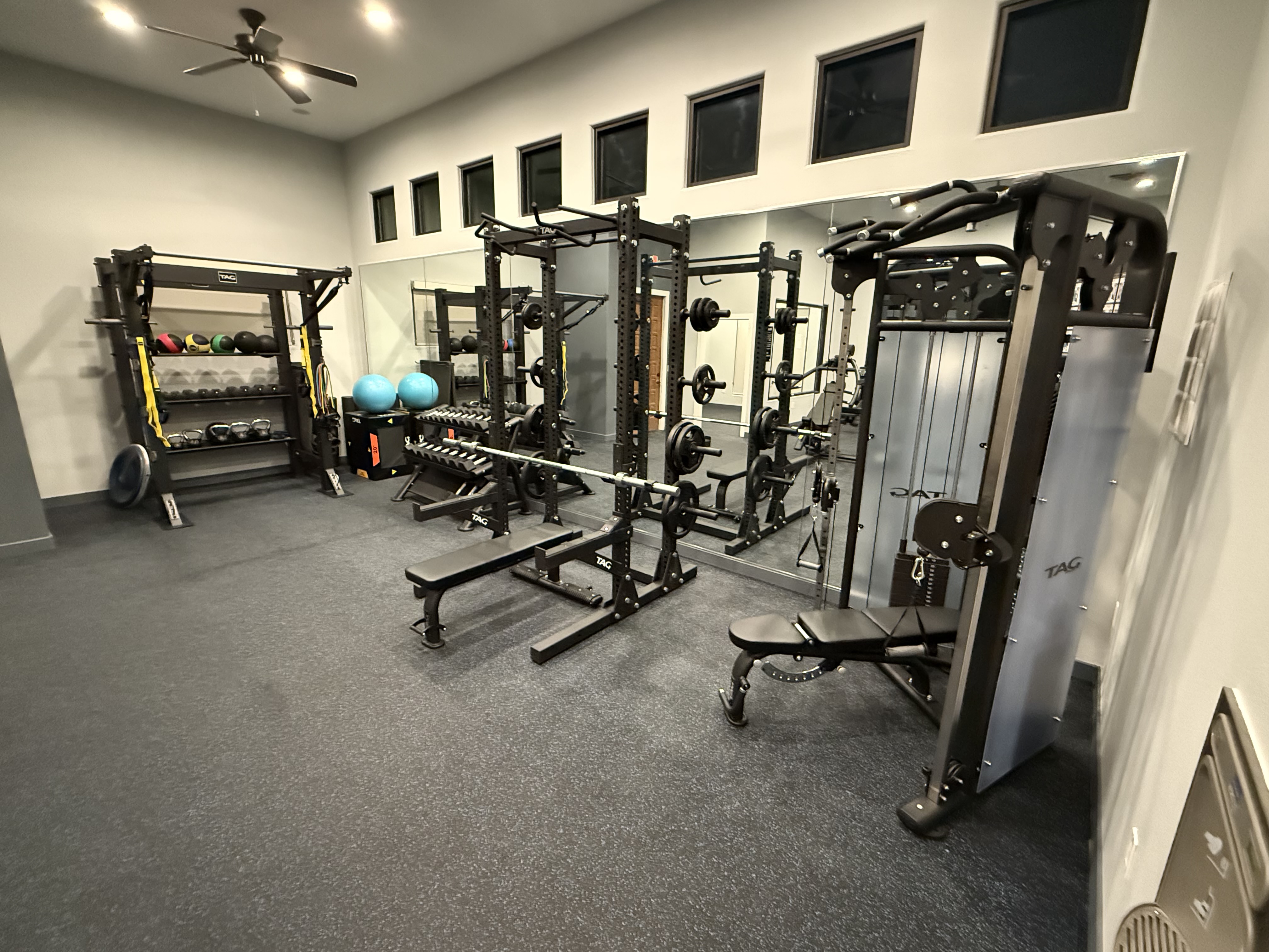 Brand new fitness center with all black equipment