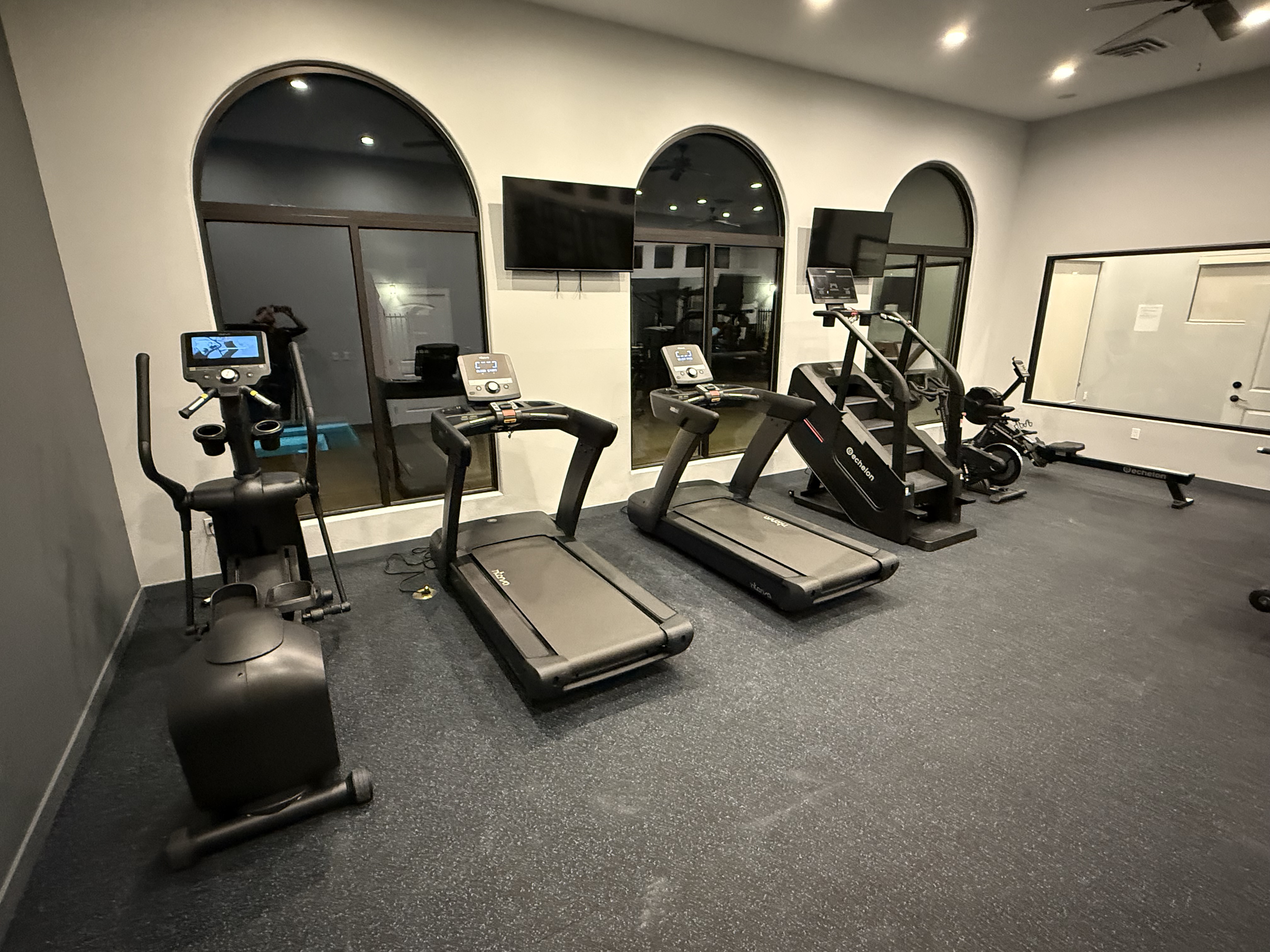 Brand new fitness center with all black equipment