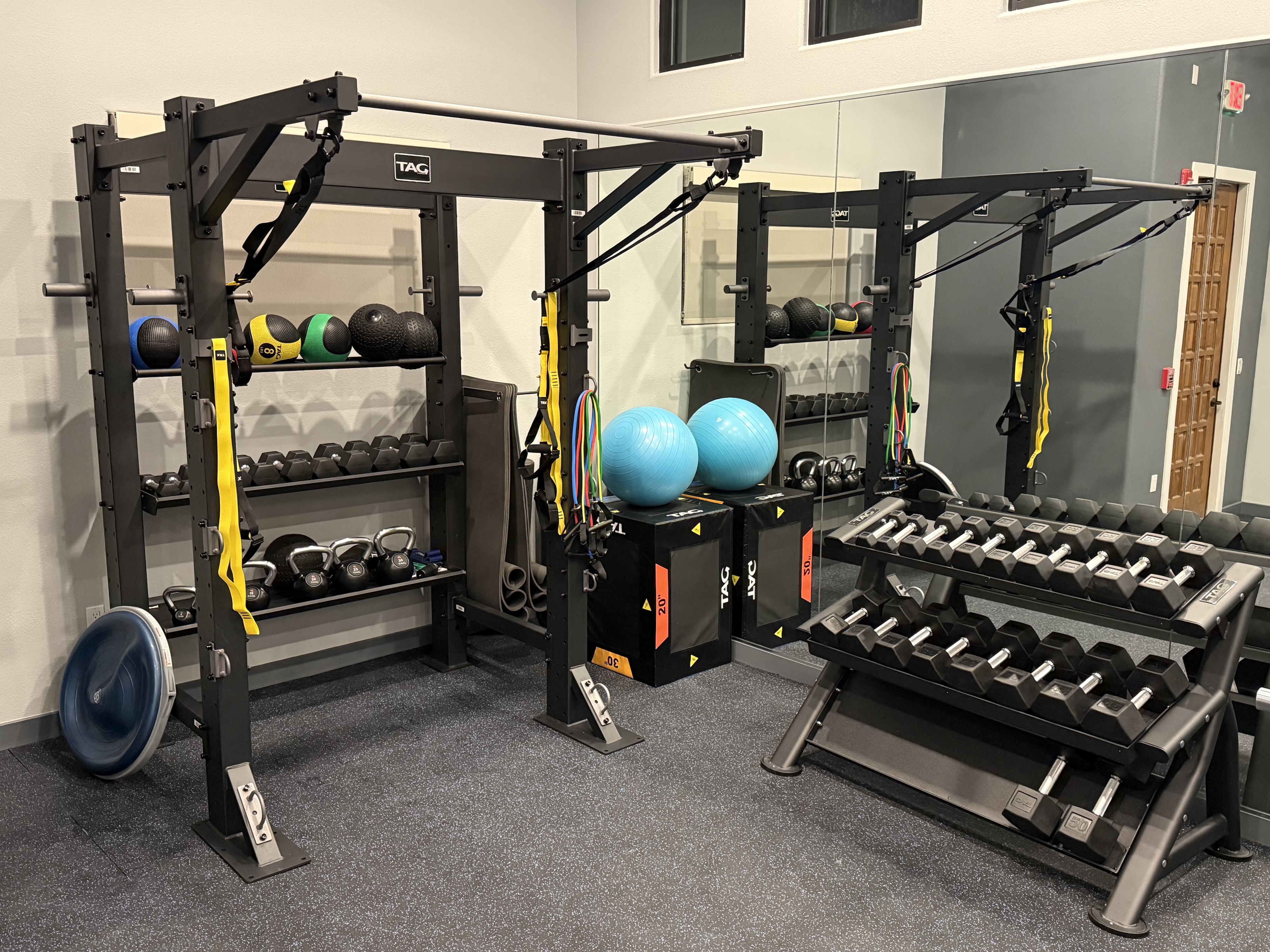 Brand new fitness center with all black equipment