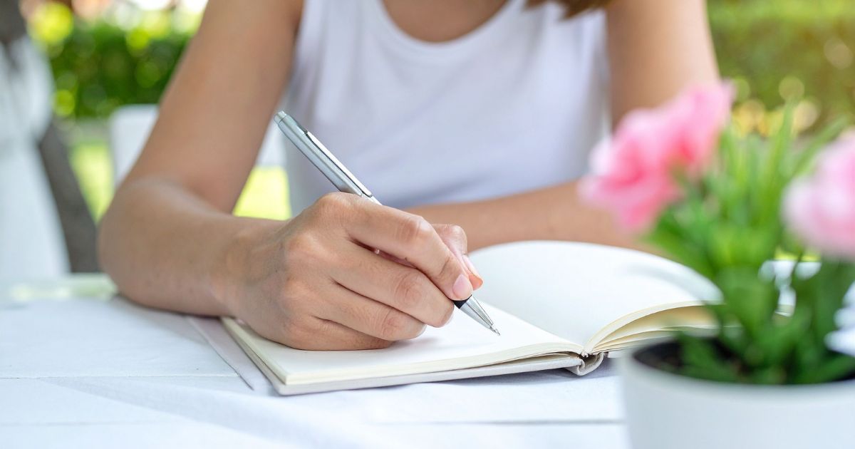 Person documenting food in a food journal