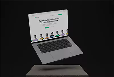 En svävande Macbook över ett betongblock.