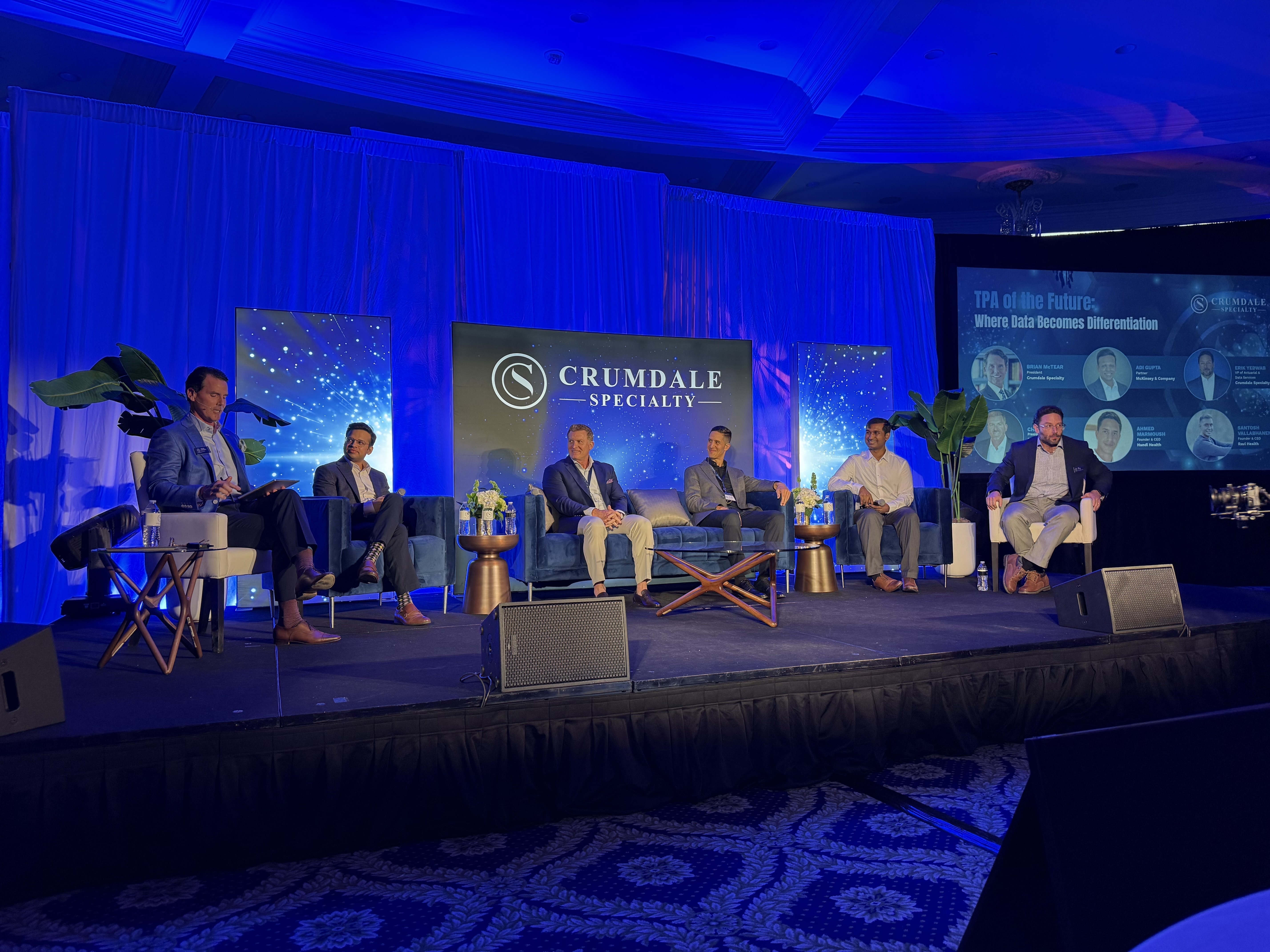 Ahmed Marmoush speaking on a panel