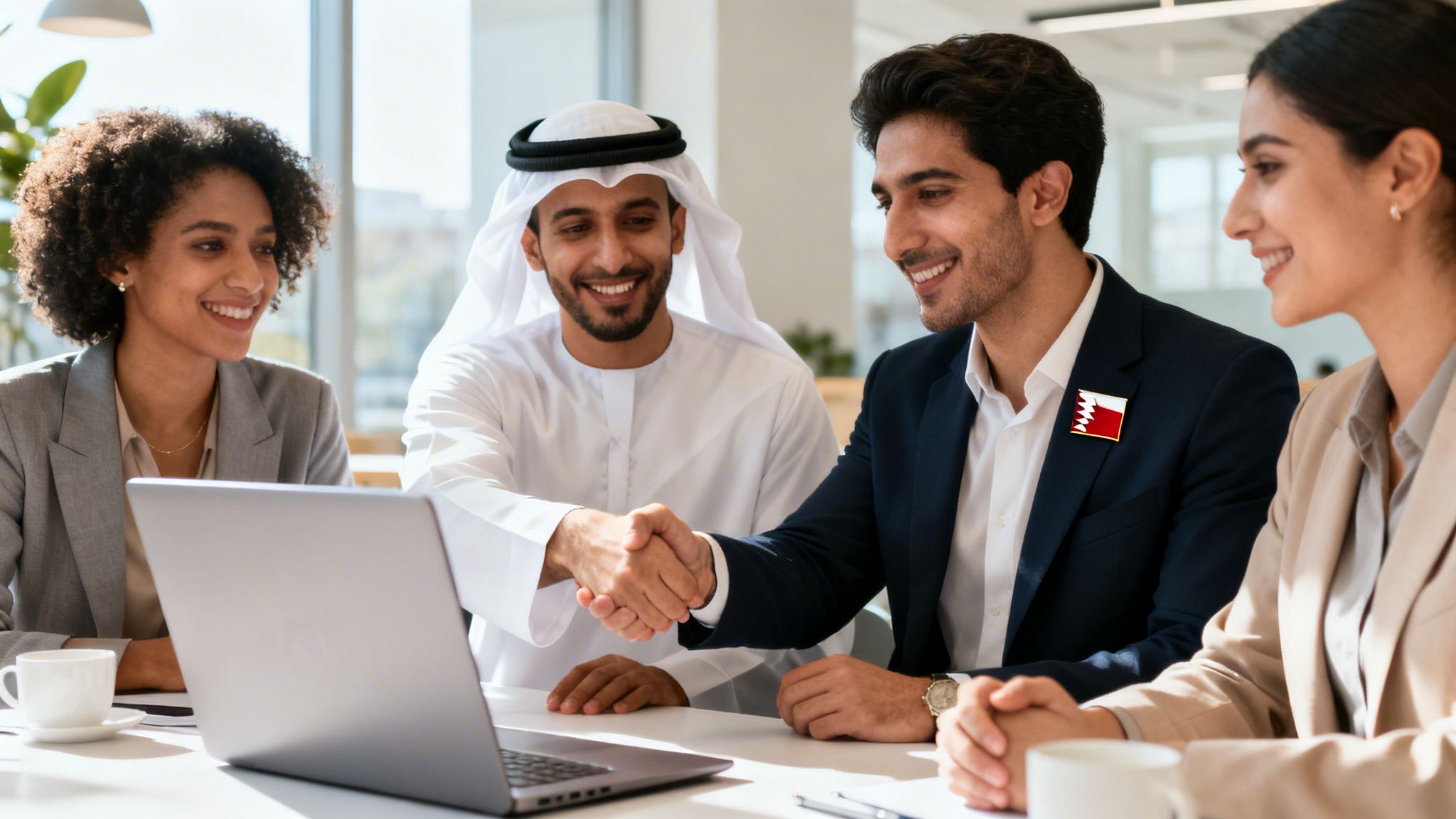 Smiling diverse business professionals shaking hands in a modern office, symbolizing partnership.