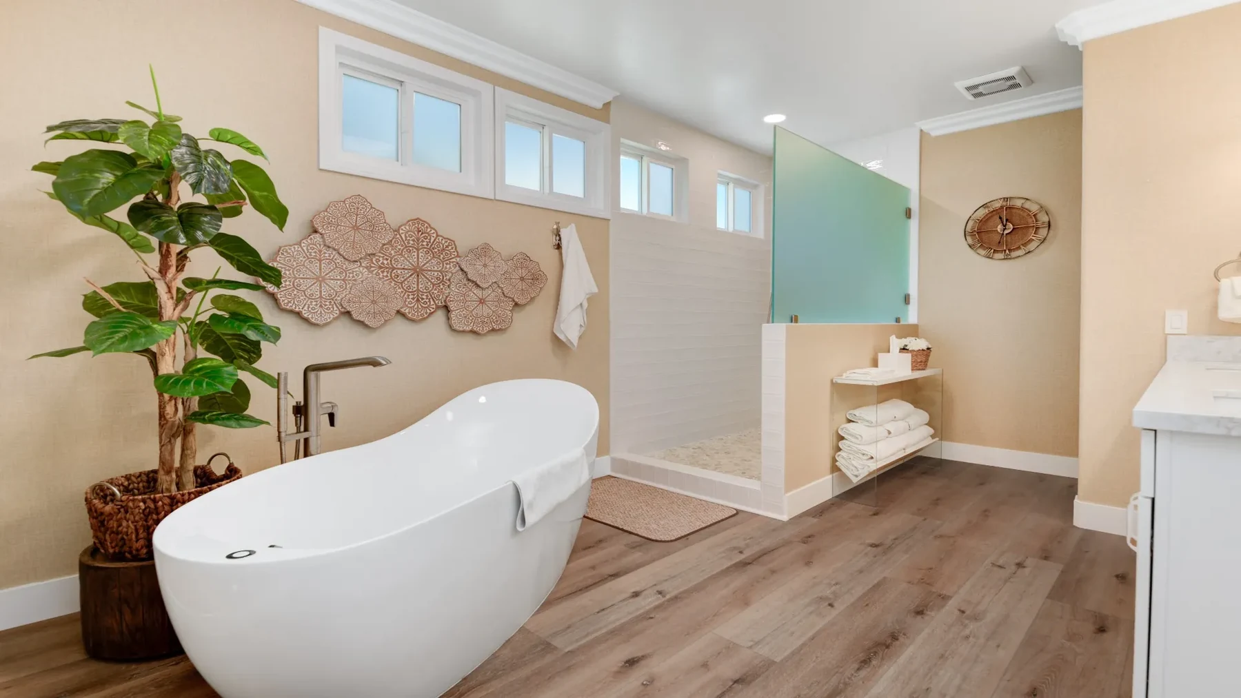 Completed bathroom with a freestanding tub and walk-in shower from Victor's remodeling work