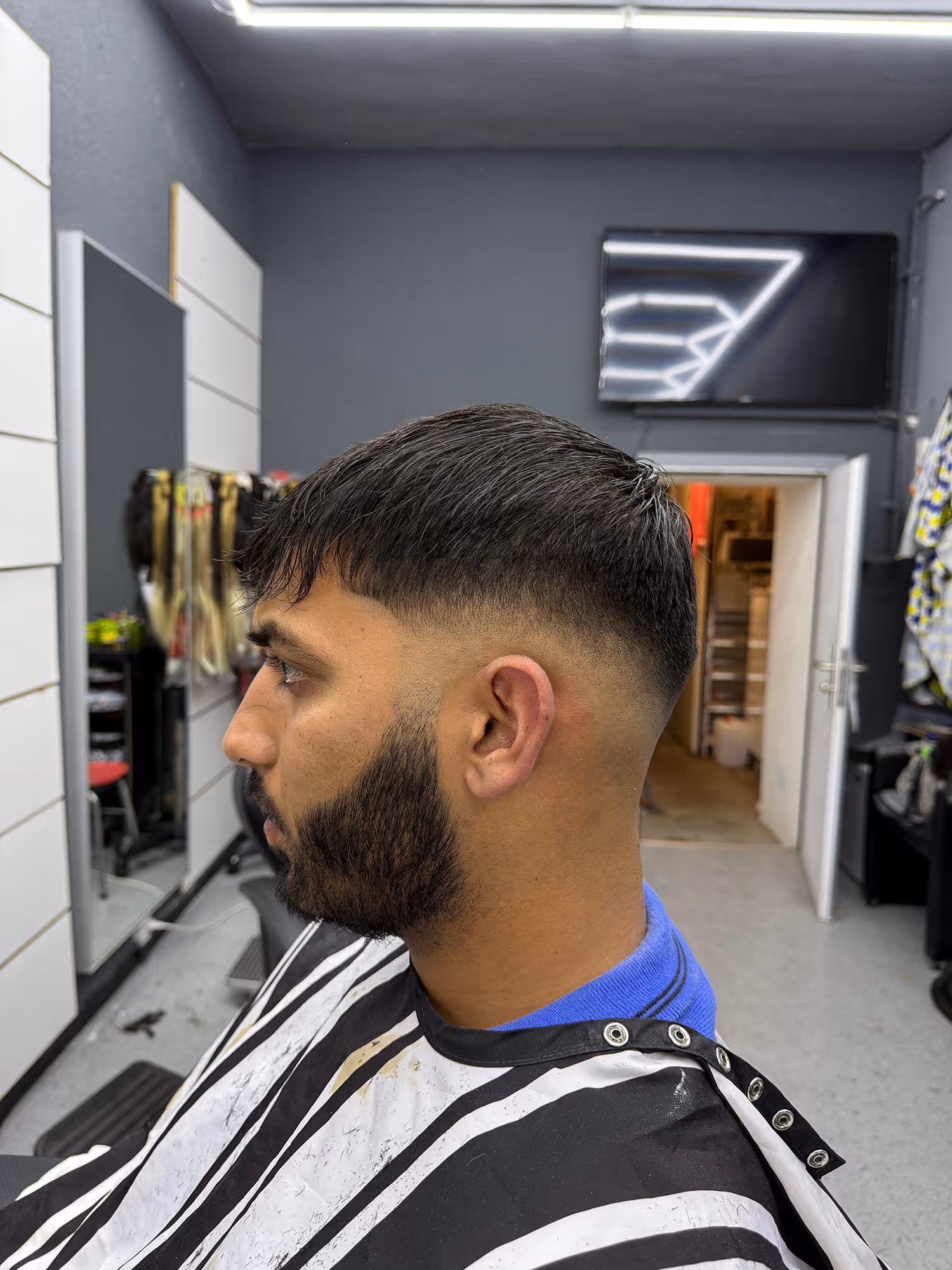 Clean fade style at Fineboy Barbershop Bern