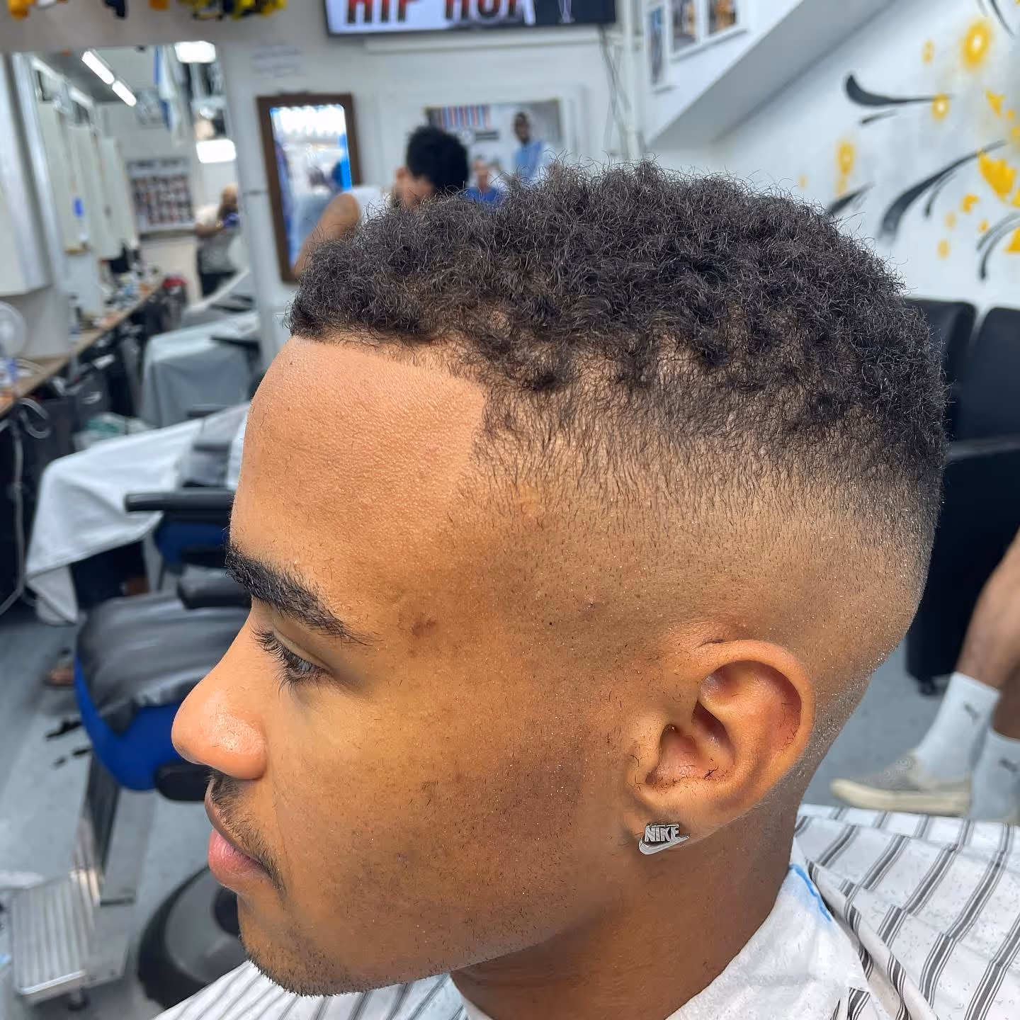 Styled fade cut at Fineboy Barbershop Bern