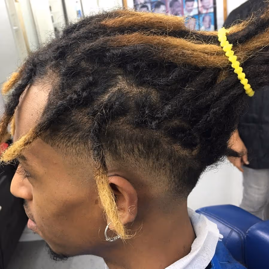 Dreadlocks and fade style at Fineboy Barbershop Bern