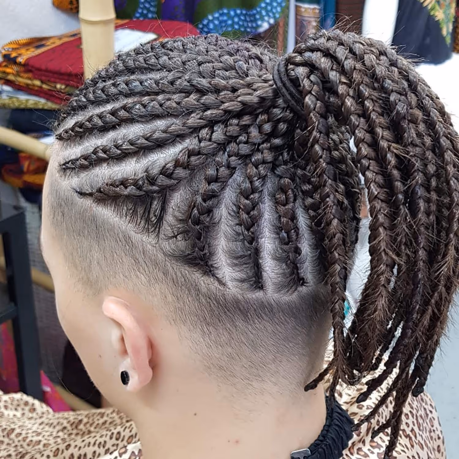 Braided hair detail at Fineboy Barbershop Bern