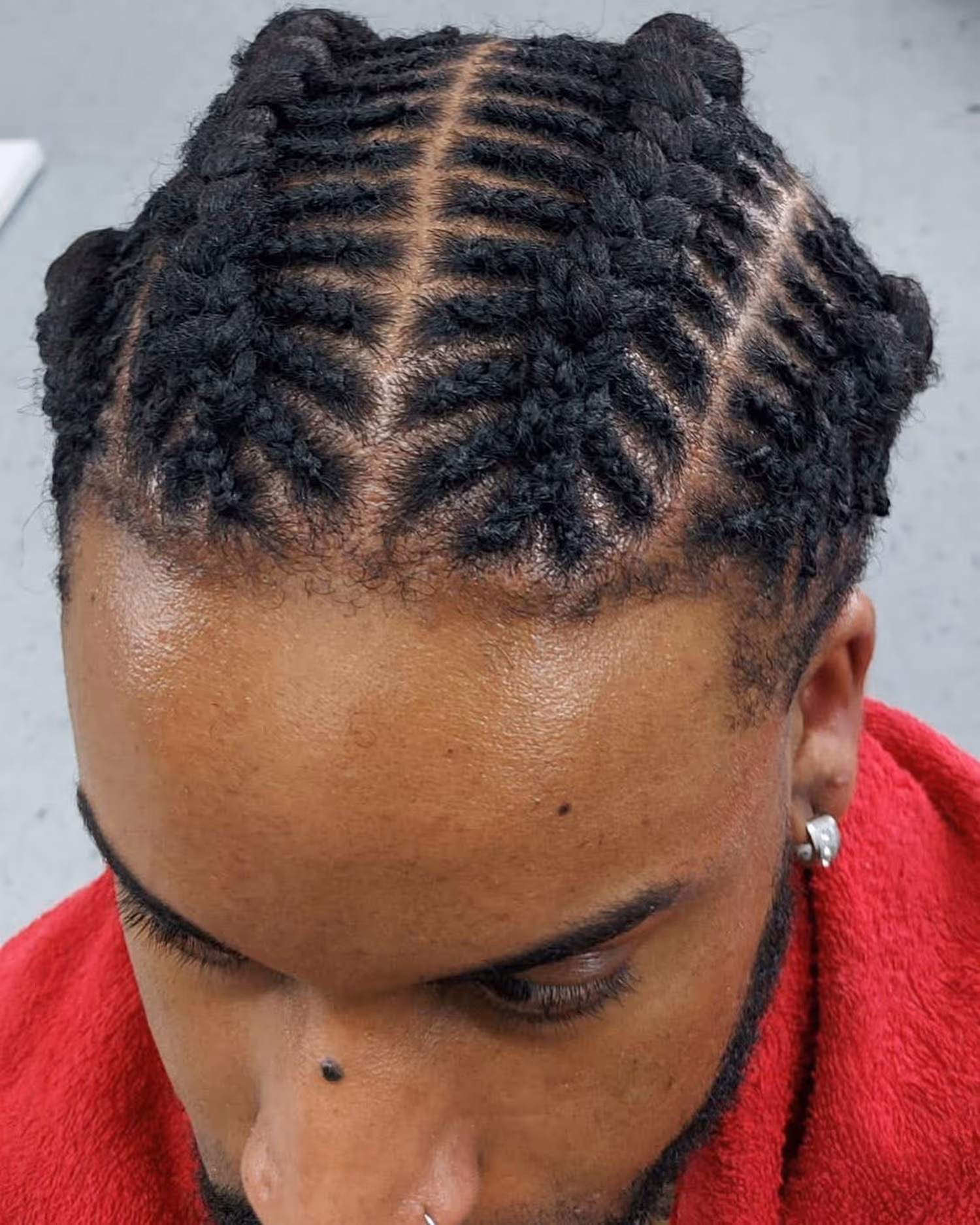 Men’s braids hairstyle at Fineboy Barbershop Bern