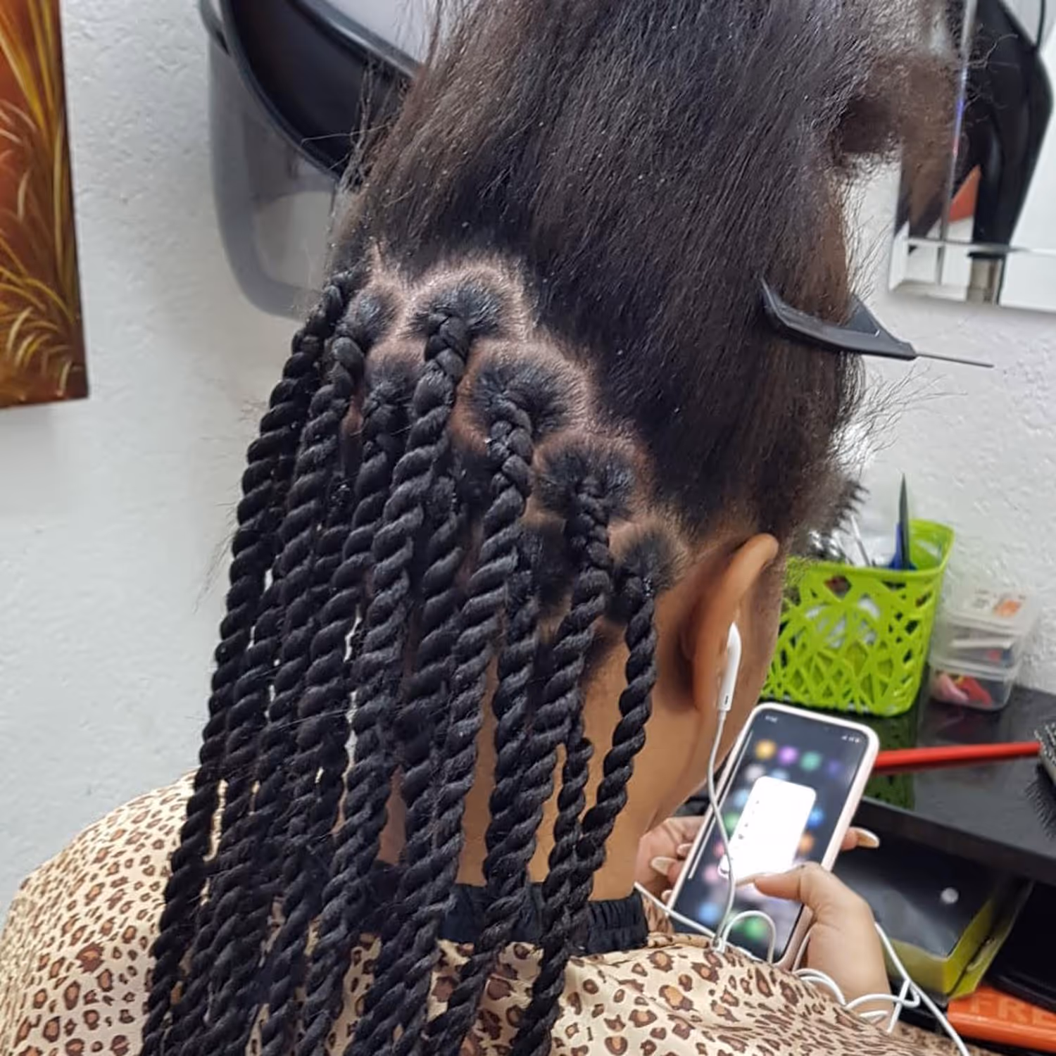 In the process of neat box braids finish at Fineboy Barbershop Bern