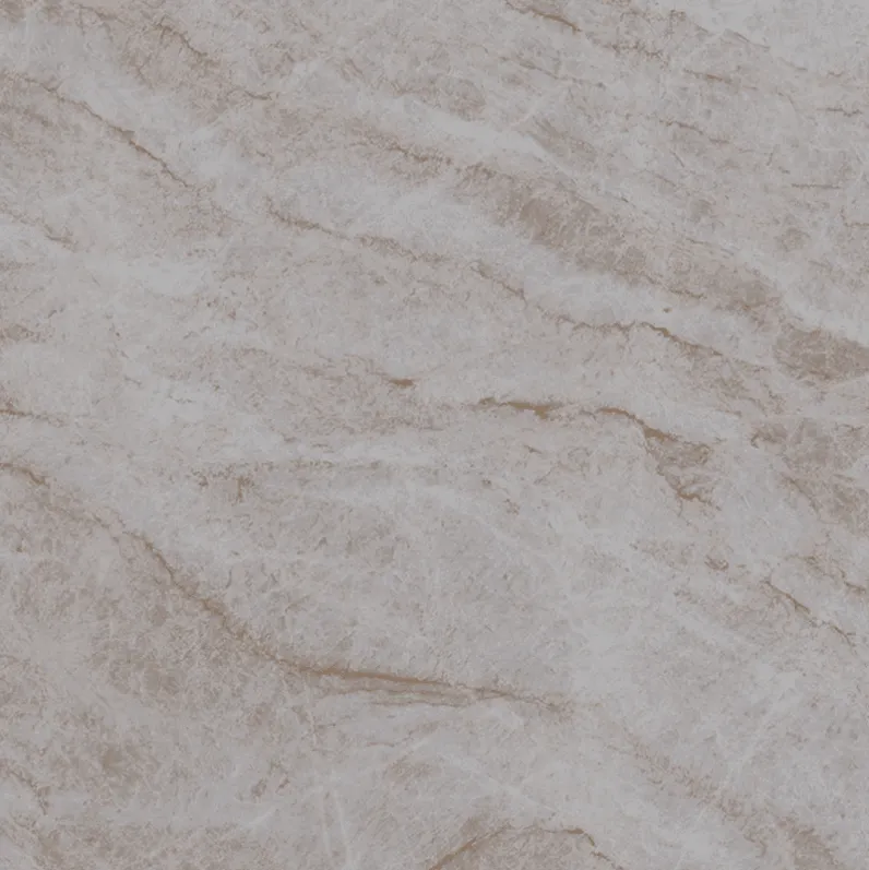 Light brown and beige stone surface with layered, wavy striations resembling sedimentary rock.