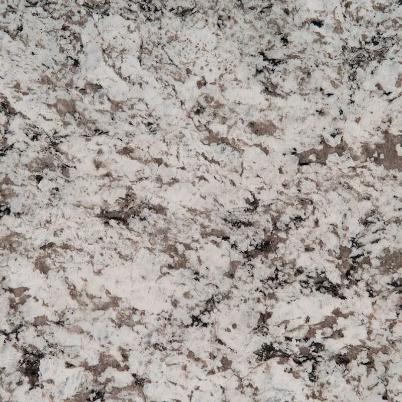 Close-up of a granite surface with a speckled pattern in shades of white, gray, and black, showcasing its natural texture and coloration.