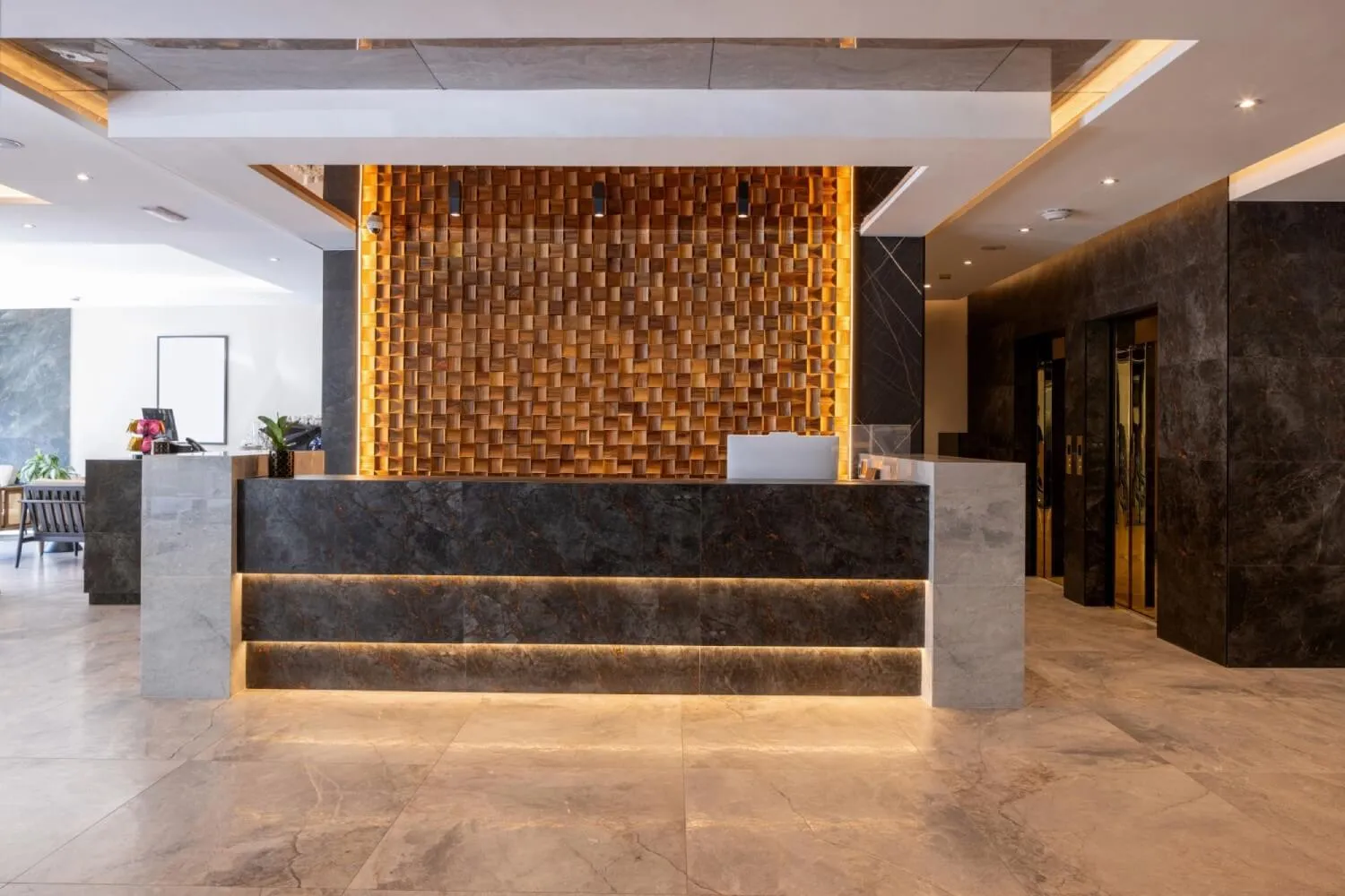 Luxury stone reception desk with custom granite design