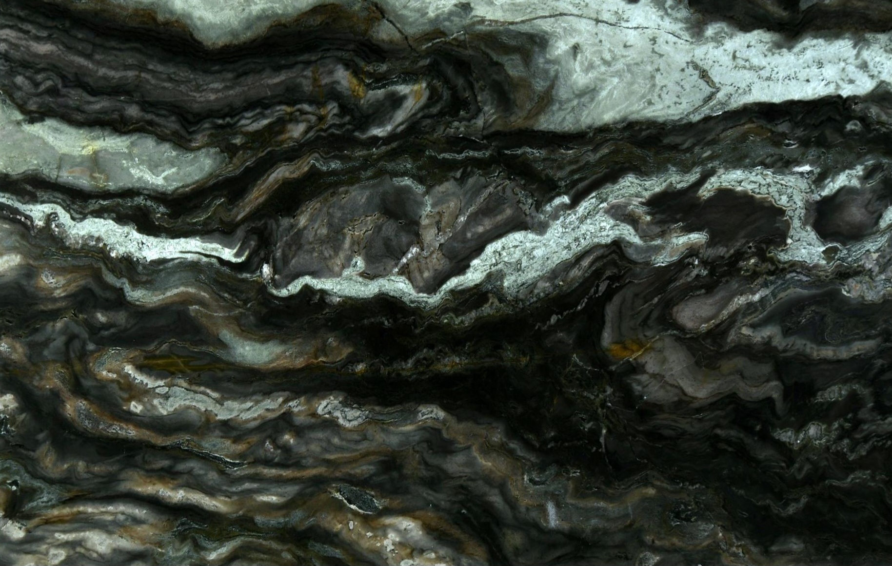 Dark green and black quartzite slab with light gold veining