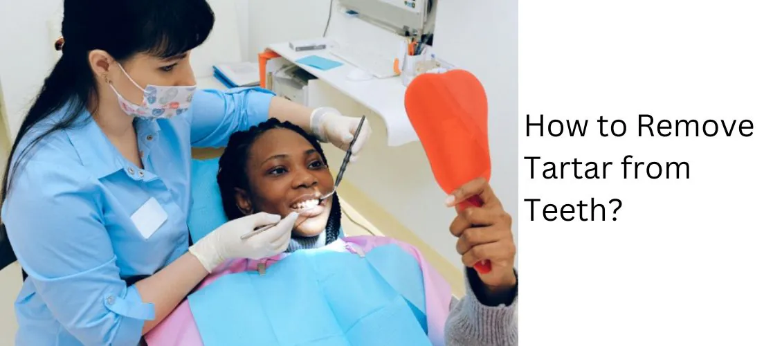 Woman holding a hand mirror during a professional teeth cleaning