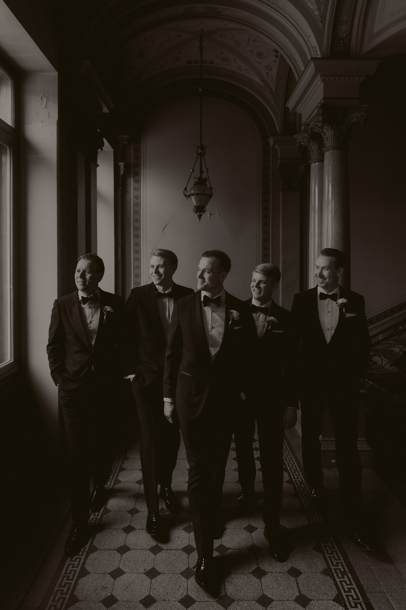 A photo of the groom and bestmans