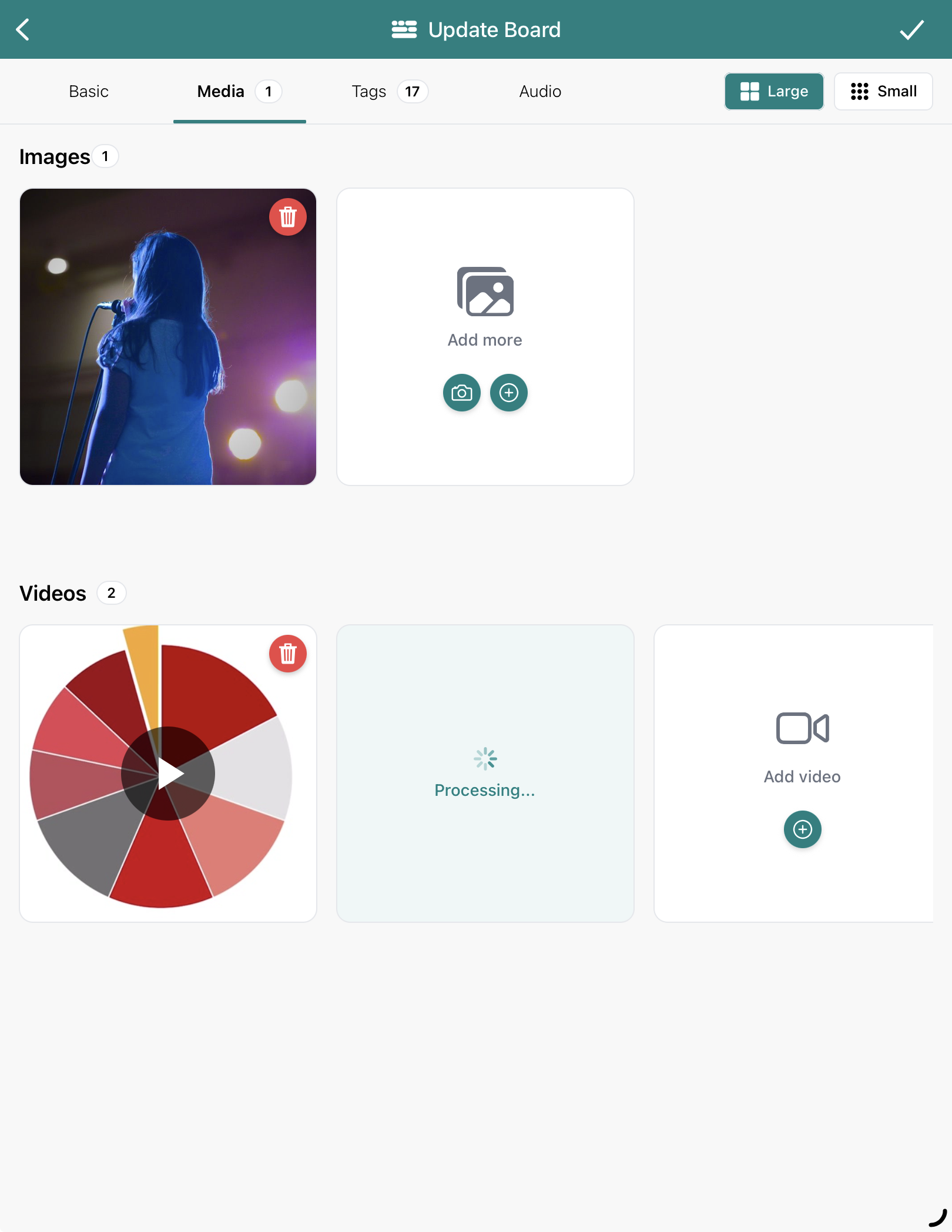 A view of adding video to a board. One video is successfully uploaded, while the other is being processed. 