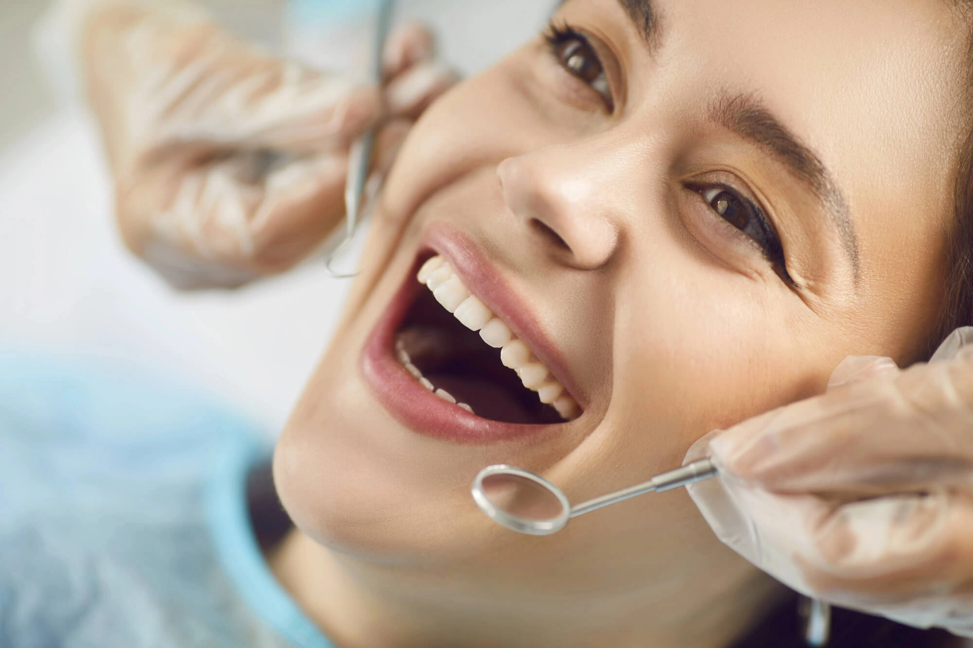 Girl having her teeth checked by a dentist levittown ny