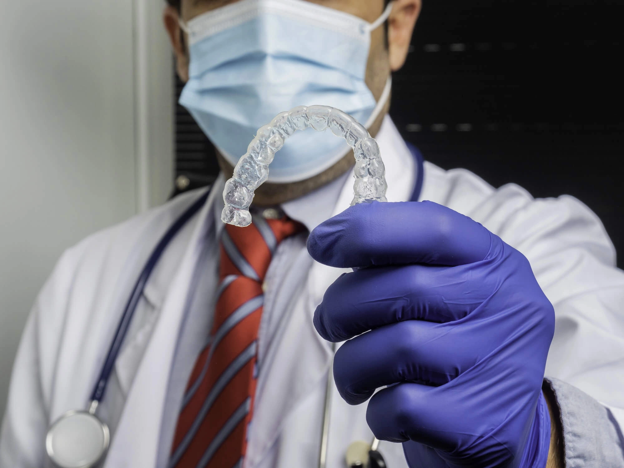 Dentist showing invisalign levittown