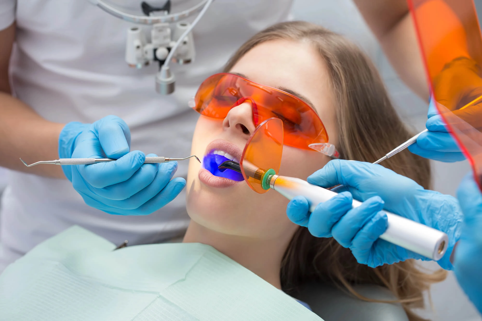 Woman undergoing fillings by restorative dentist levittown