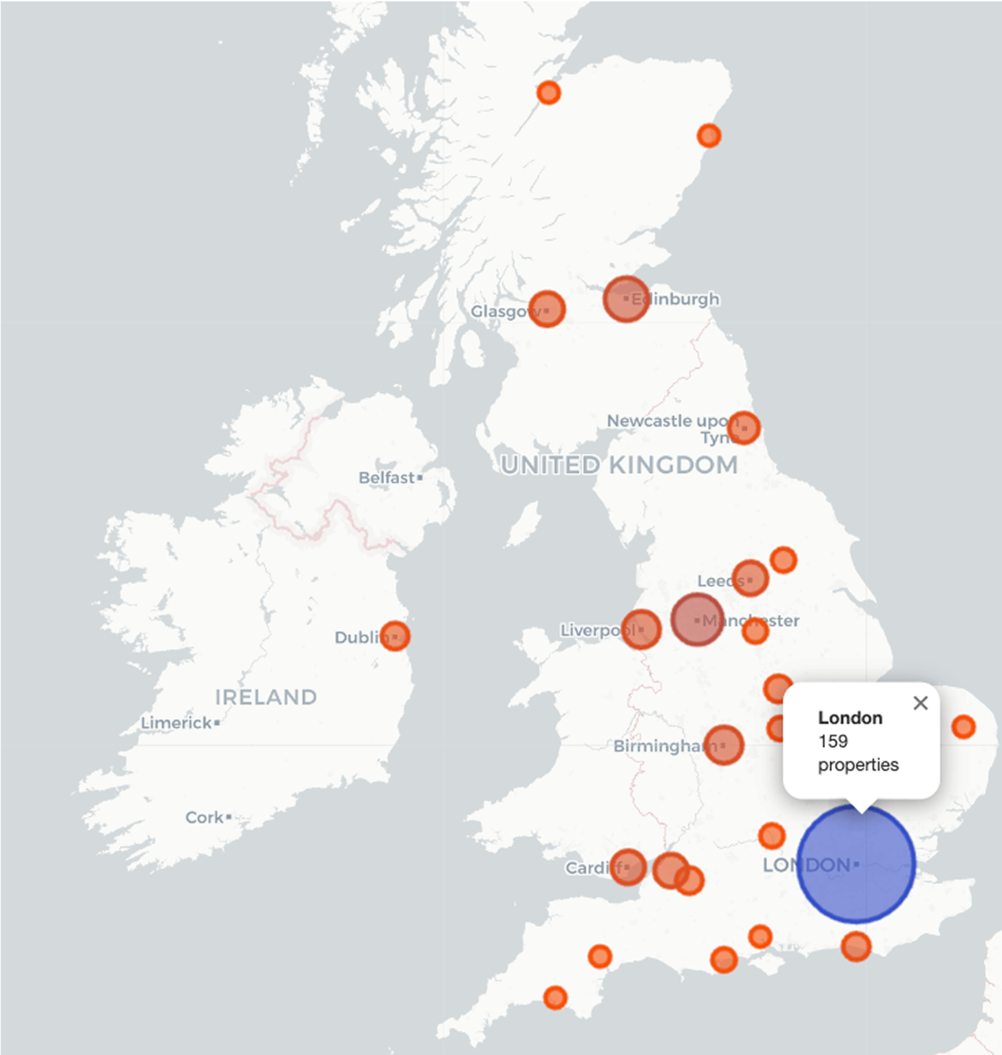 Map of Great Britain and Ireland with circle markers sized by number of short‑let properties in each city. A large blue circle marks London (159 properties). Smaller red‑orange circles denote other hubs—Manchester, Birmingham, Leeds, Cardiff, Dublin, Glasgow, Edinburgh, Newcastle and several coastal towns—each sized proportionately to their property count.