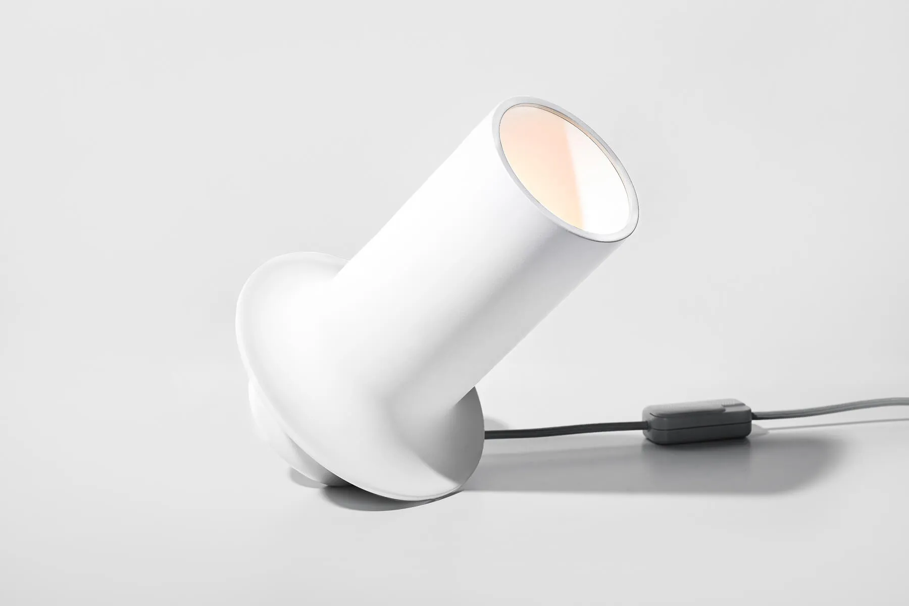 A 3D printed lamp with a telescope inspired design.