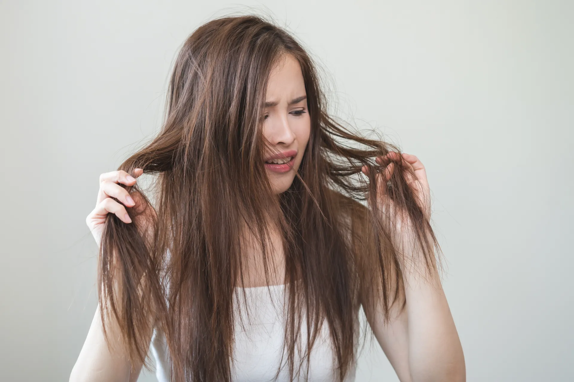 Sun, Salt & Damage: How to Repair Summer Hair Fast