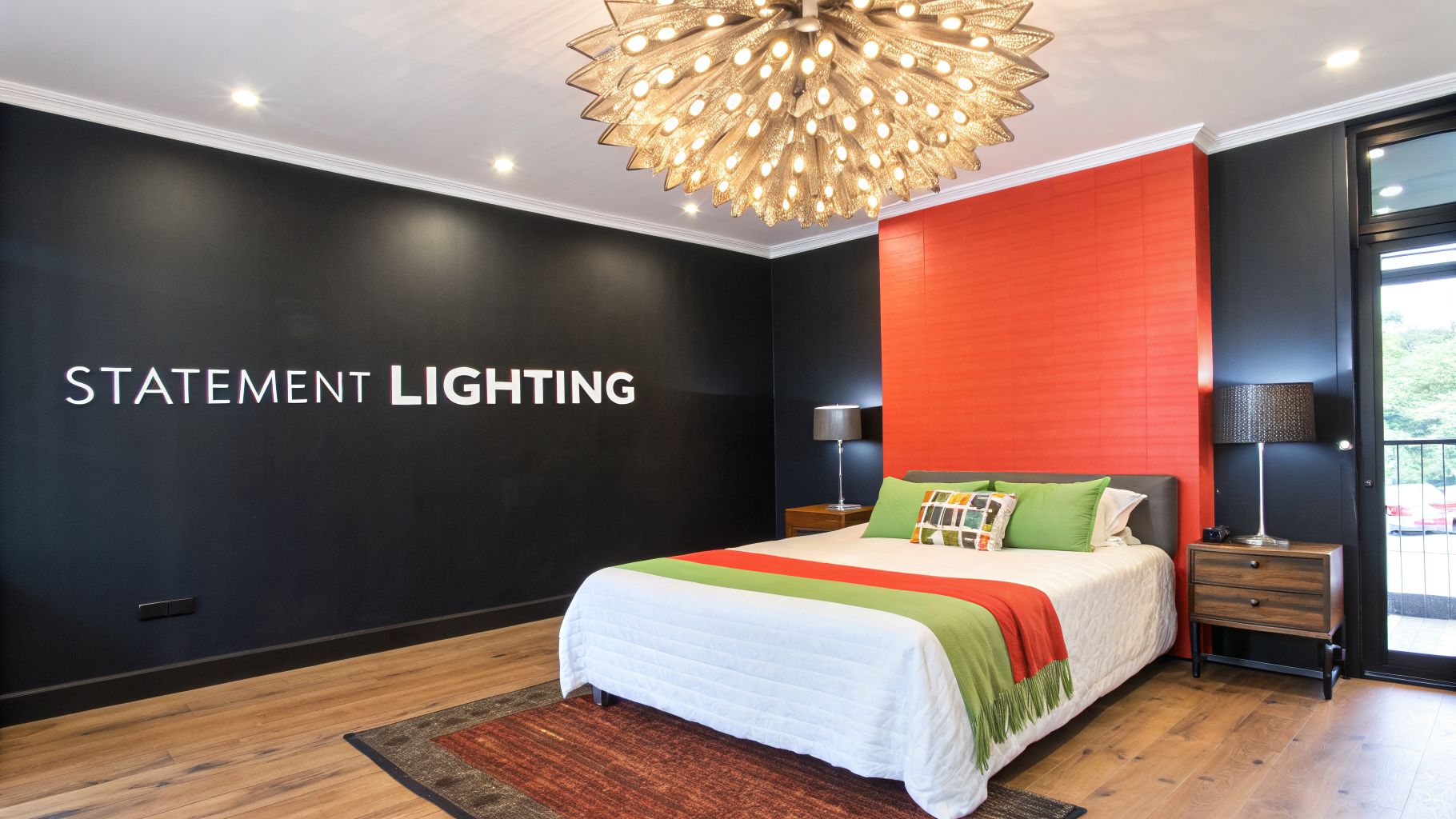 Modern bedroom interior with a black wall featuring "STATEMENT LIGHTING" and a red accent wall.